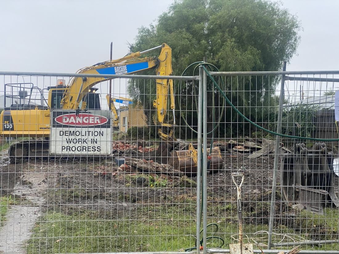 Demolition under way on the Princes Highway site in May 2021, before construction of the Geelong Healthcare Precinct